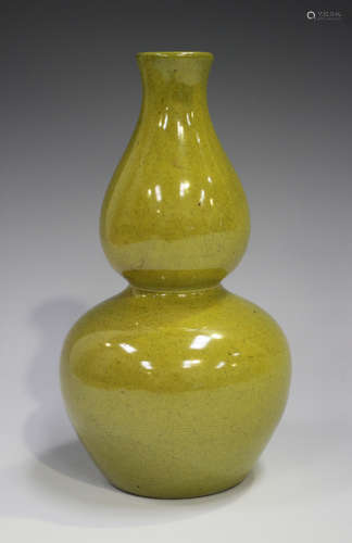 A Chinese lime green glazed double gourd shaped vase, height...