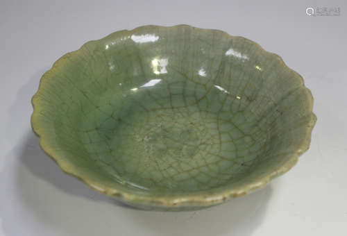 A Chinese Longquan celadon glazed stoneware dish, Ming dynas...