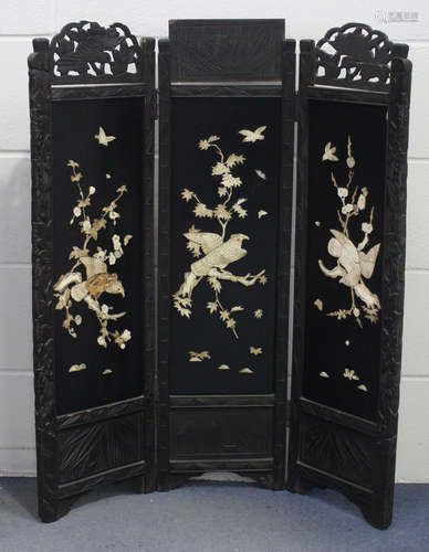 A Japanese inlaid lacquer four-fold screen, early 20th centu...