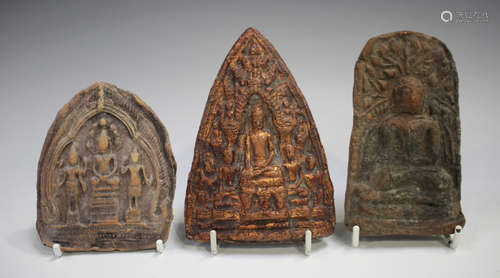 A group of three Thai pottery votive plaques/tablets, variou...