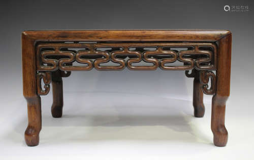 A small Chinese hardwood low table, late Qing dynasty, the r...