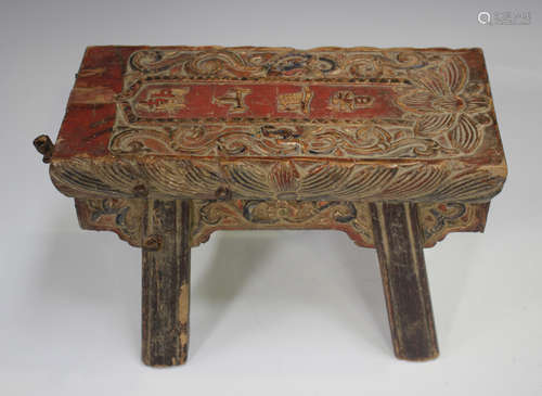 A Chinese carved and painted wooden offerings table, late Qi...