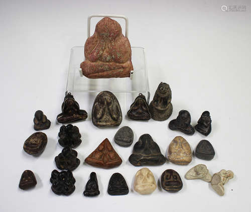 A group of Thai votive plaques/amulets, various dates, the m...