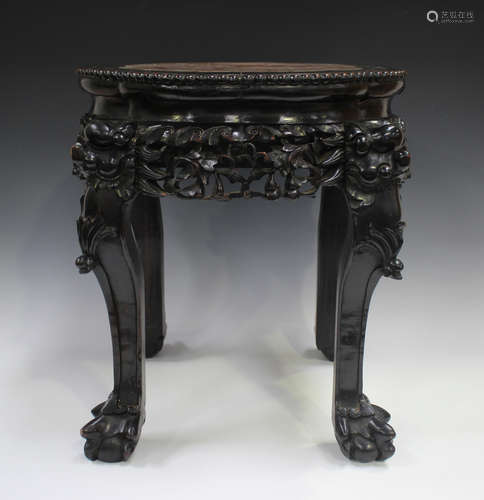 A Chinese hardwood stand, late 19th/early 20th century, the ...