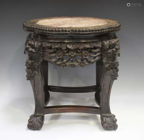 A Chinese hardwood stand, late 19th/early 20th century, the ...