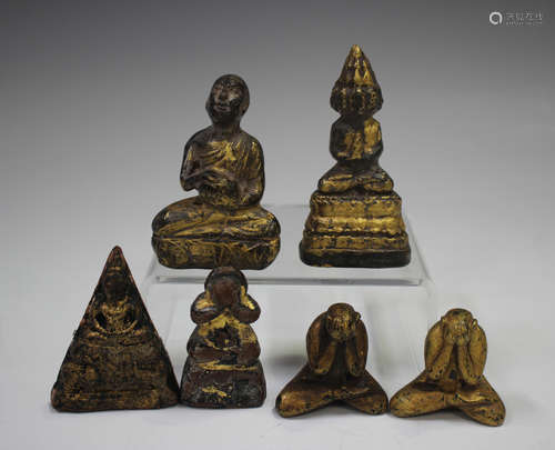 A group of six Thai gilt lacquered pottery and wood votive f...