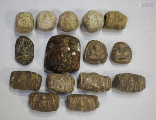 A collection of eleven Thai pottery bead rollers, various da...