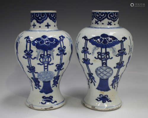 A pair of Chinese blue and white porcelain vases, Kangxi per...