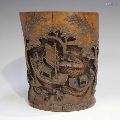 A Chinese bamboo brush pot, Qing dynasty, one side carved in...