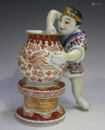 A Japanese Kutani porcelain figure group, Meiji period, mode...