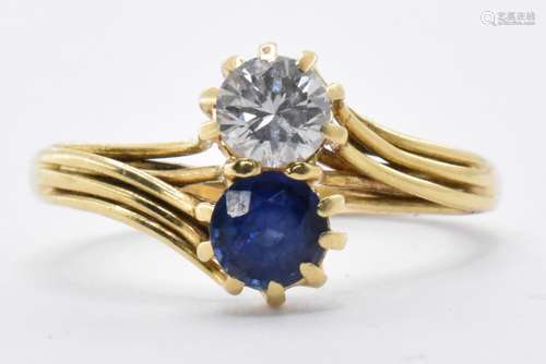 18CT GOLD DIAMOND AND SAPPHIRE CROSSOVER RING