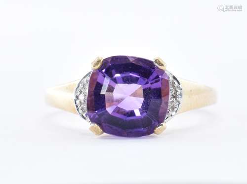 9CT GOLD PURPLE STONE AND DIAMOND RING