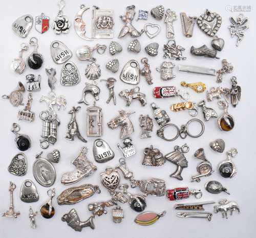 COLLECTION OF SILVER AND WHITE METAL CHARMS AND PENDANTS