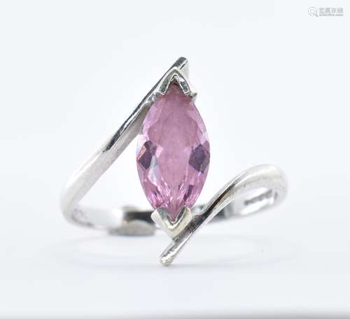 9CT WHITE GOLD AND PINK STONE CROSSOVER RING