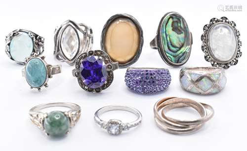 TWELVE SILVER STONE SET DRESS RINGS