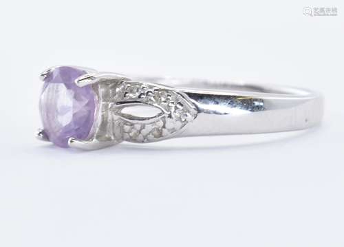 HALLMARKED WHITE GOLD DIAMOND & PURPLE STONE RING