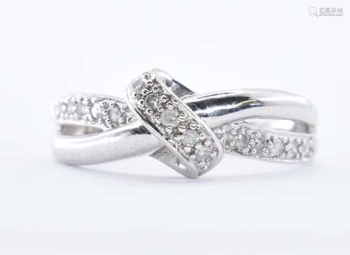 HALLMARKED 9CT WHITE GOLD & DIAMOND CROSSOVER RING