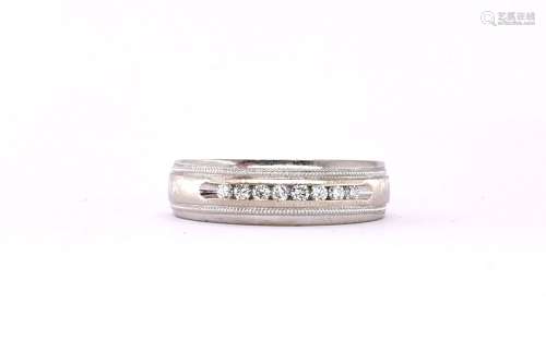 STAMPTED 14CT WHITE GOLD AND PAVE SET DIAMOND RING.
