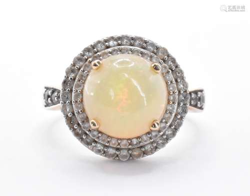 9CT GOLD OPAL AND WHITE STONE RING