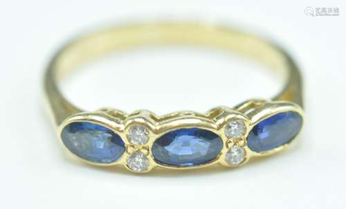 18CT GOLD SAPPHIRE AND DIAMOND RING