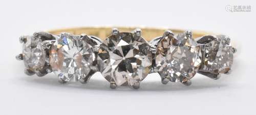 18CT GOLD AND DIAMOND FIVE STONE RING