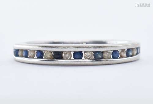 9CT GOLD SAPPHIRE AND DIAMOND HALF ETERNITY RING