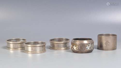 GROUP OF FIVE SILVER HALLMARKED NAPKIN RINGS.