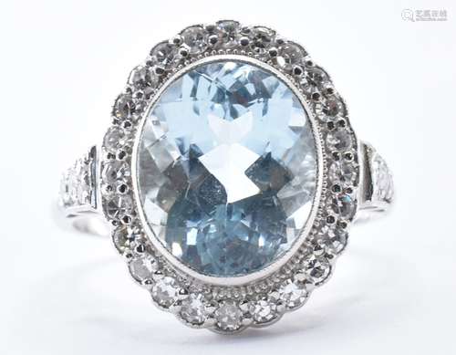 AQUAMARINE AND DIAMOND WHITE GOLD RING