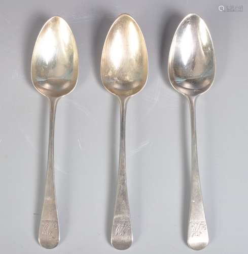 THREE GEORGE III HALLMARKED SILVER SERVING SPOONS.