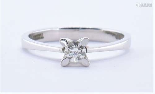 14CT WHITE GOLD AND DIAMOND SOLITAIRE RING