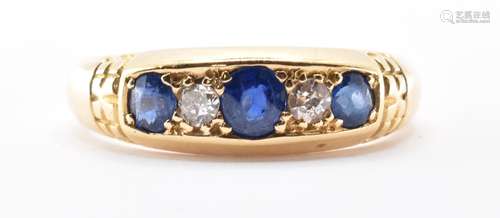 18CT GOLD SAPPHIRE AND DIAMOND FIVE STONE RING