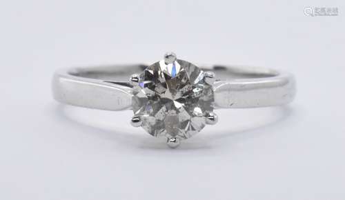 18CT WHITE GOLD AND DIAMOND SOLITAIRE RING