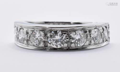 18CT WHITE GOLD AND DIAMOND HALF ETERNITY RING