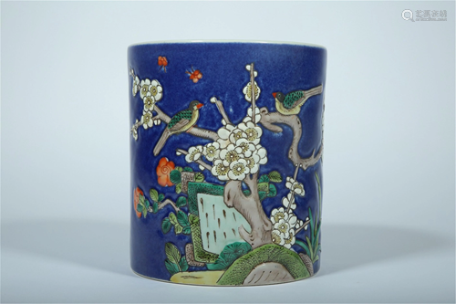 A BLUE GROUND FAMILLE ROSE BRUSH POT