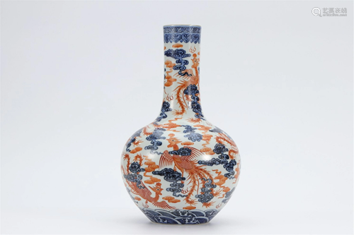 A BLUE AND WHITE IRON-RED PHOENIXES VASE