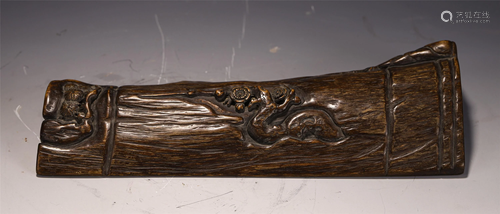 A CHENXIANG WOOD CARVED ARM REST