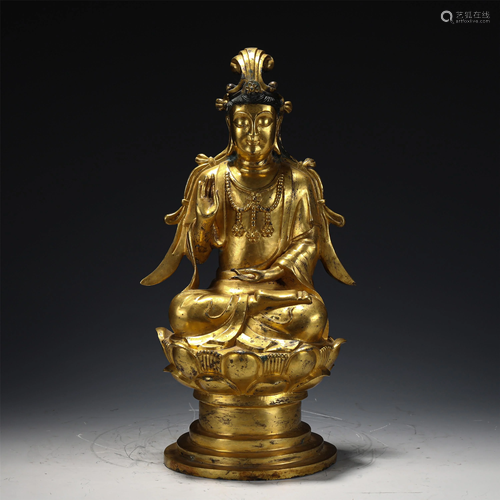 A GILT BRONZE SEATED BUDDHA STATUETTE