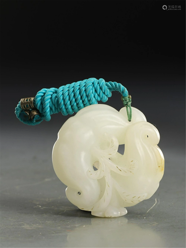 A WHITE JADE CARVING