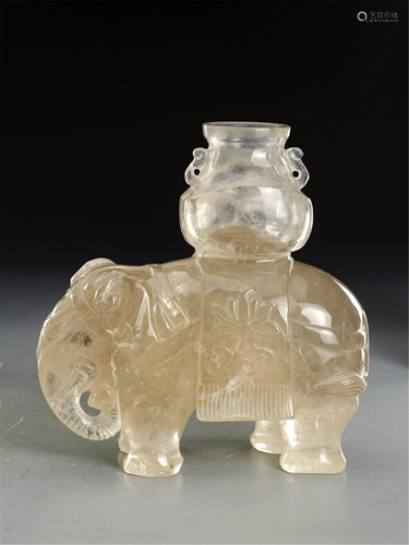 A CRYSTAL CARVING OF ELEPHANT AND VASE