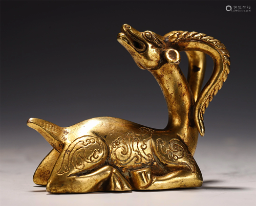 A DEER SHAPE GILT BRONZE PAPERWEIGHT