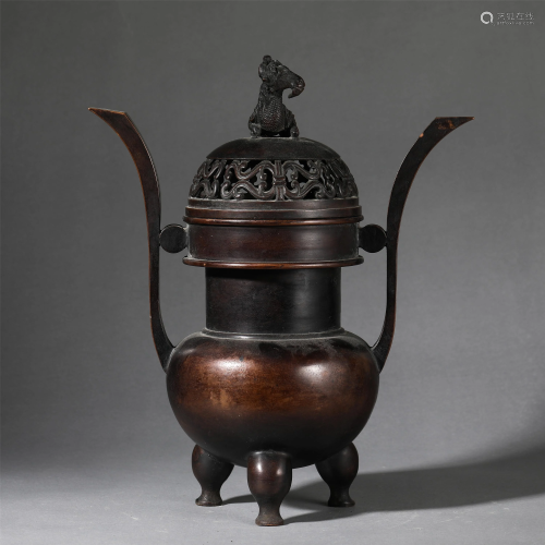 A BRONZE CENSER WITH DOUBLE HANDLES