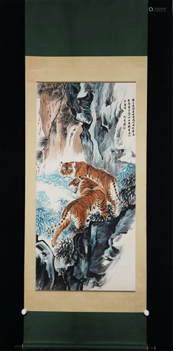 A CHINESE SCROLL PAINTING DEPICTING TWO TIGERS