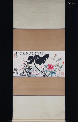 A CHINESE SCROLL PAINTING OF FLOWERS