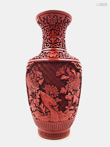 A CARVED RED LACQUER FLORAL VASE