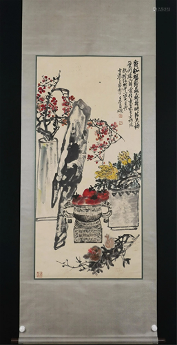 A CHINESE SCROLL PAINTING OF FLOWERS AND FRUITS