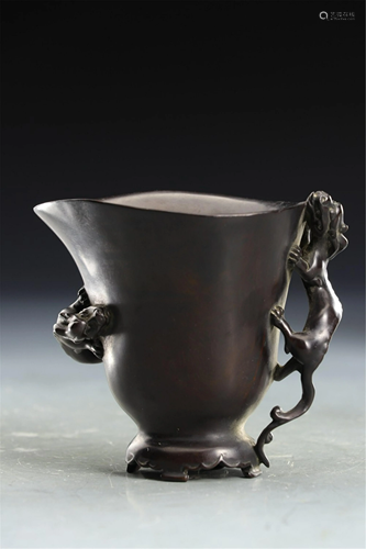 A CARVED CHI-DRAGON HARDWOOD JUE CUP