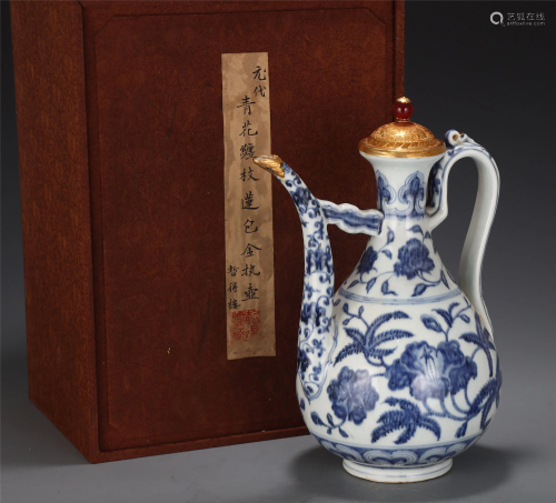 A GOLD MOUNTED BLUE AND WHITE FLORAL EWER