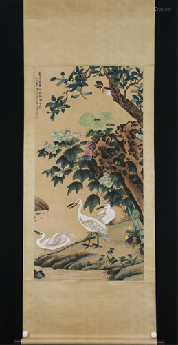 A CHINESE SCROLL PAINTING OF FLOWERS AND BIRDS