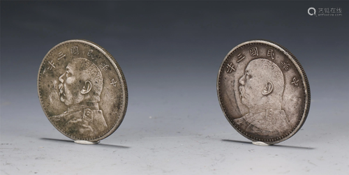 PAIR OF SILVER COINS