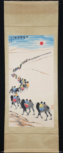 A CHINESE PAINTING OF ACROSS THE DESERT ON CAMELS